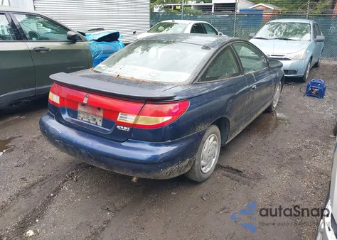1999 Saturn Sc1 z USA, uszkodzony, nr VIN 1G8ZP1284XZ348752